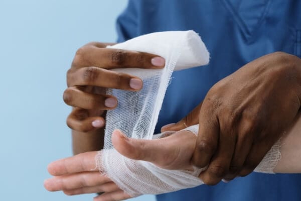 A hands with a bandage.